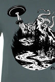 T-shirt with a graphic design of a UFO, alien, and Sasquatch in a forest setting.
Just Another Day Graphic Tee. Black and White on Indigo Tee.  An original design of Just Another Day with Sasquatch, by a fire with his Alien friend, and a Kraken over the Mountain. SQUATCH Industries, Northwest Outdoor Cotton Tees