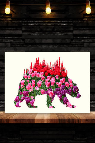 BEAR of TULIPS. Digital photo art design.  This photo on during a great trip to the Skagit Valley Tulip Festival.  Located near the towns of La Conner, Mount Vernon and Burlington, not to many sites anywhere are as colorful as the tulips of the Skagit Valley in the spring. A beautiful day on one of our great adventures. Bear of Tulips Photo Art Print by Steve and Dalton Lovitt of SQUATCH Industries. Bear print available on White on Maroon Graphic Tee. Available in 11x14 print.