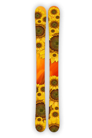 SUNFLOWER.  Sunflowers ski wraps don't get much brighter then this just like the summer and sun shine they thrive on.  Let this set bring some bright colors and sunshine to your skiing.    Two wraps per set.   Size:   Large:  73”H x 6”W -  187cm x 15cm            $62.95  Small:  60”H x 5”W -  152.5cm x 10.2cm     $50.00